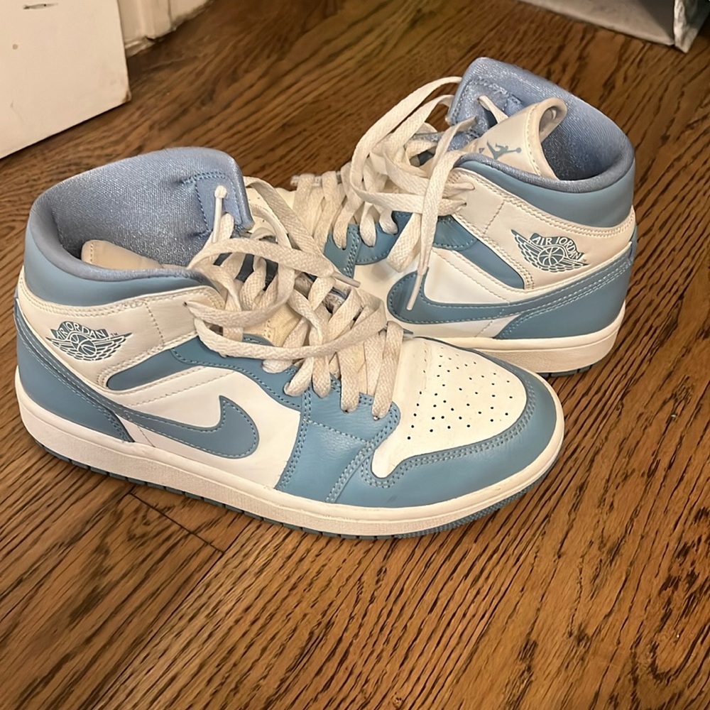Light blue and white woman’s Nike Air Jordan’s